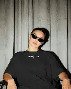 editorial-t-shirt-mockup-on-model-with-moody-lighting-and-draped-backdrop-shadow-contrast-03938.webp